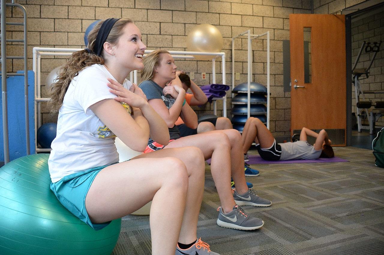 A group of students working out in the gym